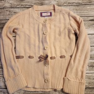 OshKosh Girls Button Down Sweater 5T Beige with brown ribbon detail.